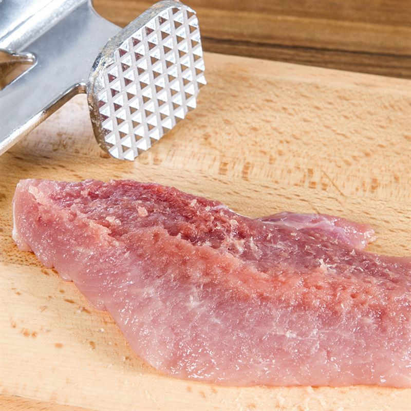 Heavy-duty meat tenderizer with dual faces for better results. Heavy-duty meat tenderizer with dual faces for better results.
